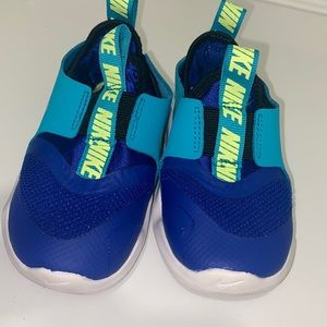 Green and white Nikes 8c flex runners